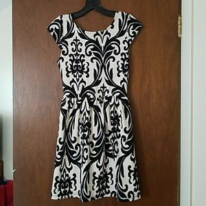 Black and white scooped back dress